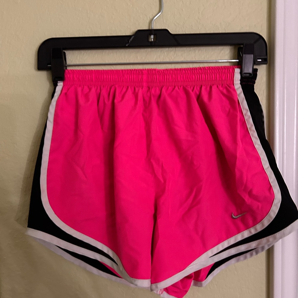 Pink Nike athletic shorts